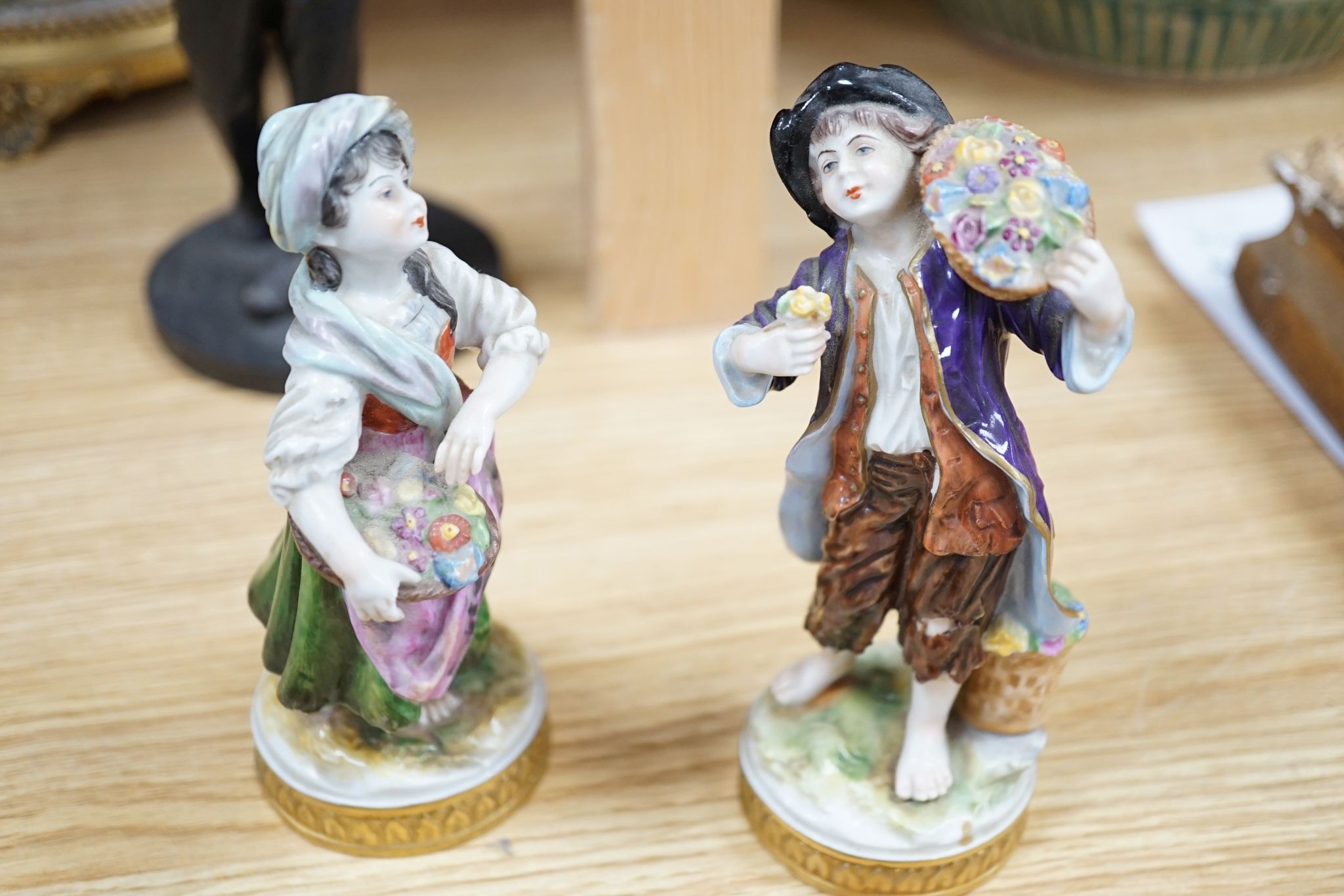 A group of various porcelain figures including Copenhagen, Paragon, Doulton etc., 29cm